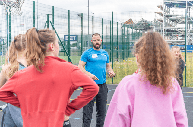 Young people master dunking skills at multi-use games area launch