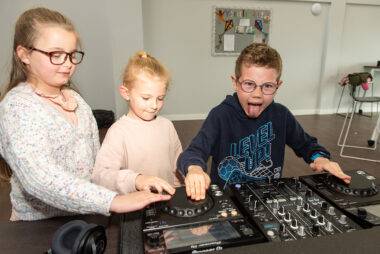 YMCA Y-kids - Children having fun and smiling during DJ and Music Production Session